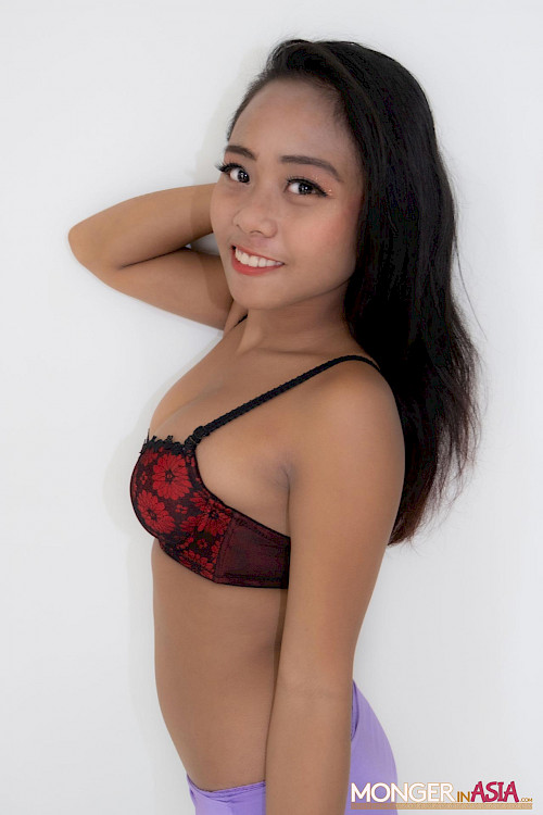 hot asian girl in red bra and purple panties looking into camera