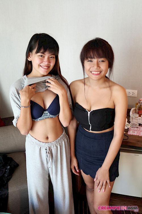 Two cute asian girls getting nude Picture 4